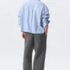 Pantalones de chándal holgados de tejido scuba – Gris oscuro jaspeado Pantalones de chándal holgados de tejido scuba – Gris oscuro jaspeado
