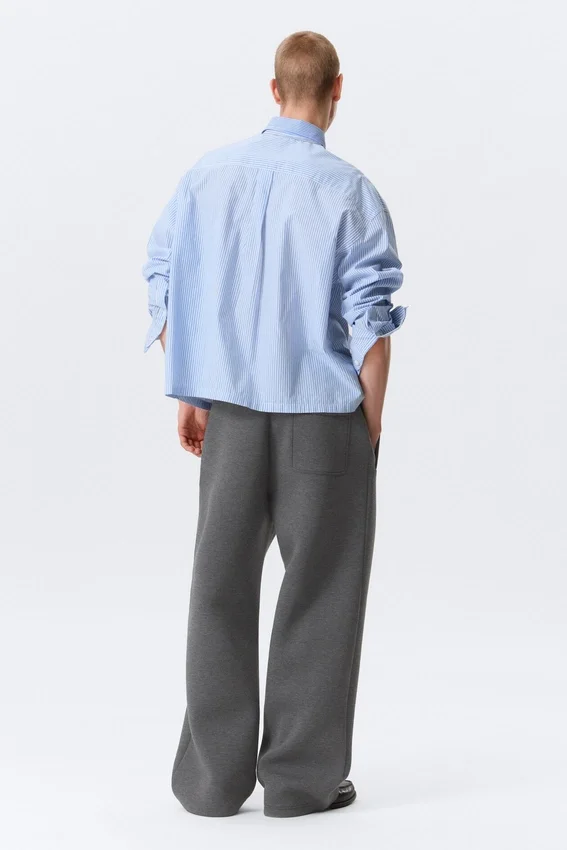 Pantalones de chándal holgados de tejido scuba – Gris oscuro jaspeado Pantalones de chándal holgados de tejido scuba – Gris oscuro jaspeado
