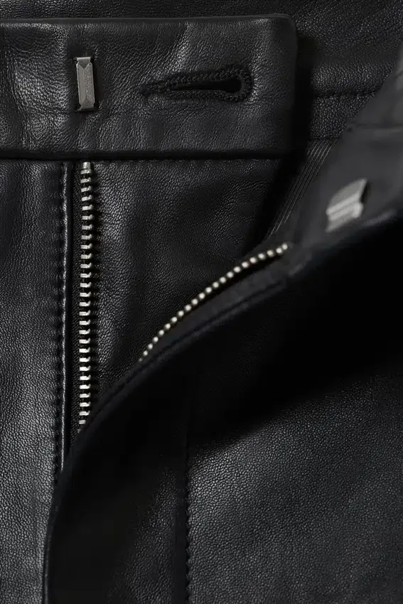 Pantalones de cuero de talle bajo y pierna ancha – Negro Pantalones de cuero de talle bajo y pierna ancha – Negro