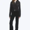 Pantalones de jersey de talle bajo y corte acampanado – Negro Pantalones de jersey de talle bajo y corte acampanado – Negro