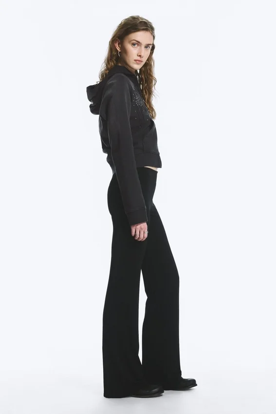 Pantalones de jersey de talle bajo y corte acampanado – Negro Pantalones de jersey de talle bajo y corte acampanado – Negro