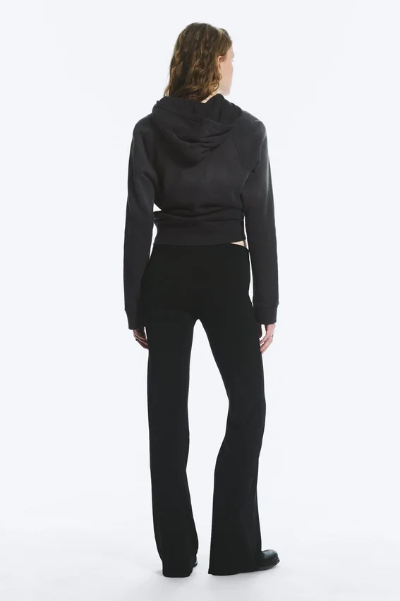 Pantalones de jersey de talle bajo y corte acampanado – Negro Pantalones de jersey de talle bajo y corte acampanado – Negro