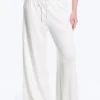 Pantalones de lyocell de talle medio, corte holgado y pierna ancha – Blanco Pantalones de lyocell de talle medio, corte holgado y pierna ancha – Blanco