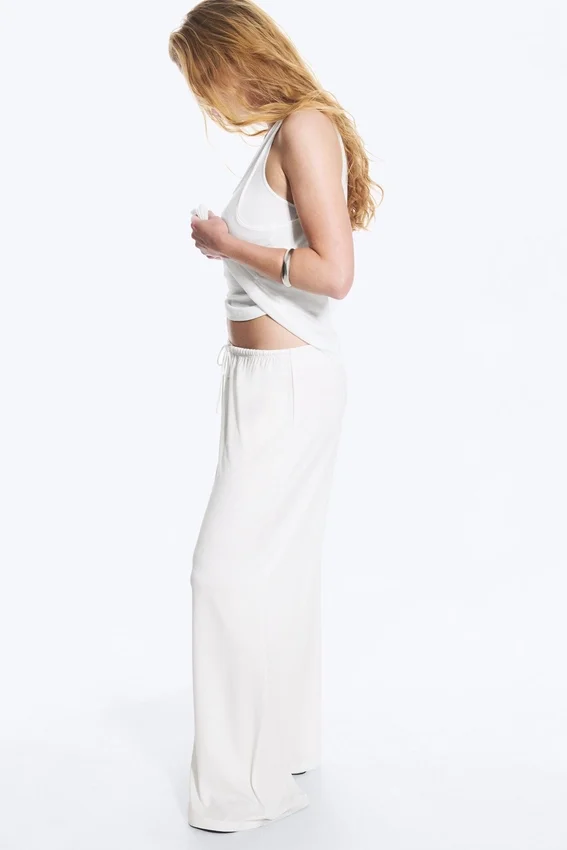Pantalones de lyocell de talle medio, corte holgado y pierna ancha – Blanco Pantalones de lyocell de talle medio, corte holgado y pierna ancha – Blanco