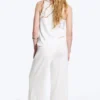 Pantalones de lyocell de talle medio, corte holgado y pierna ancha – Blanco Pantalones de lyocell de talle medio, corte holgado y pierna ancha – Blanco