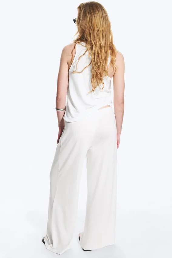 Pantalones de lyocell de talle medio, corte holgado y pierna ancha – Blanco Pantalones de lyocell de talle medio, corte holgado y pierna ancha – Blanco