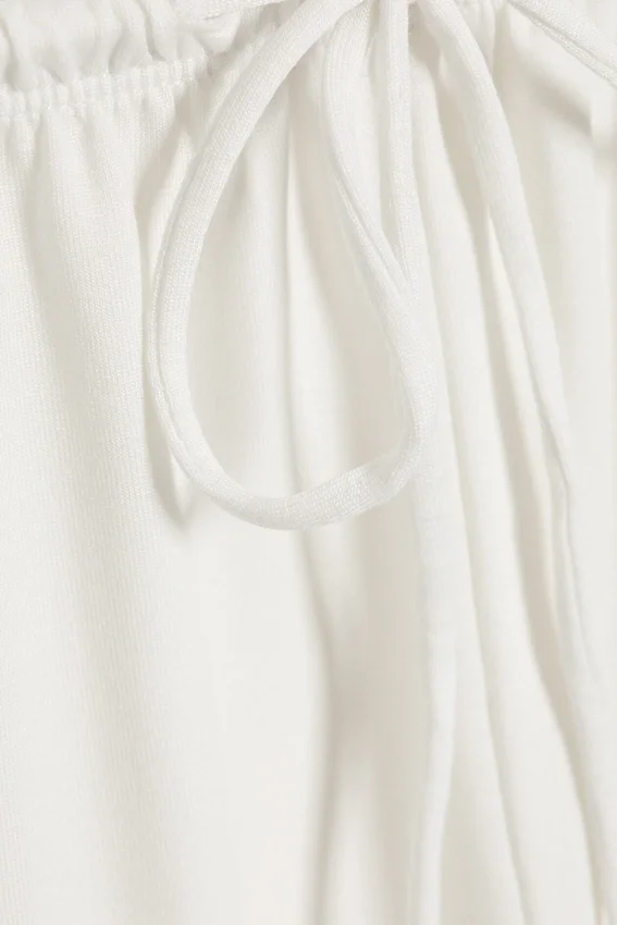 Pantalones de lyocell de talle medio, corte holgado y pierna ancha – Blanco Pantalones de lyocell de talle medio, corte holgado y pierna ancha – Blanco