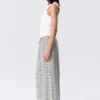 Pantalones de lyocell de talle medio, corte holgado y pierna ancha – Blanco – Rayas grises Pantalones de lyocell de talle medio, corte holgado y pierna ancha – Blanco – Rayas grises
