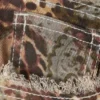 Pantalones de sarga de cintura baja con bordes deshilachados – Estampado de cachemira Pantalones de sarga de cintura baja con bordes deshilachados – Estampado de cachemira