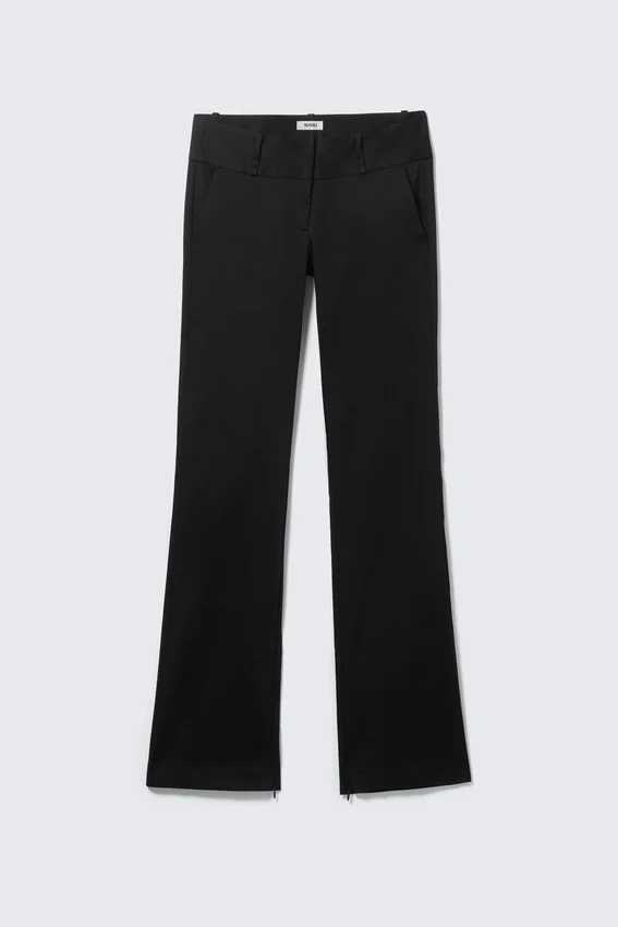 Pantalones de satén de talle bajo con cremallera en el bajo – Negro Pantalones de satén de talle bajo con cremallera en el bajo – Negro