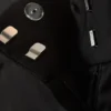 Pantalones de satén de talle bajo con cremallera en el bajo – Negro Pantalones de satén de talle bajo con cremallera en el bajo – Negro