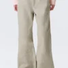 Pantalones de talle bajo, corte holgado y acampanado – Light Mole Pantalones de talle bajo, corte holgado y acampanado – Light Mole