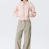 Pantalones de talle bajo, corte holgado y acampanado – Light Mole Pantalones de talle bajo, corte holgado y acampanado – Light Mole