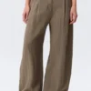 Pantalones de talle bajo y pierna ancha con efecto arrugado – Beige Pantalones de talle bajo y pierna ancha con efecto arrugado – Beige