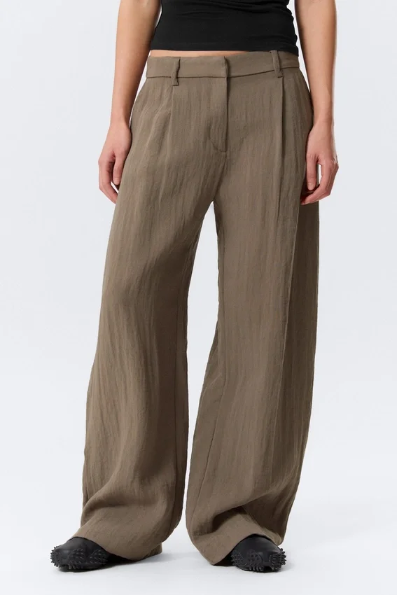 Pantalones de talle bajo y pierna ancha con efecto arrugado – Beige Pantalones de talle bajo y pierna ancha con efecto arrugado – Beige