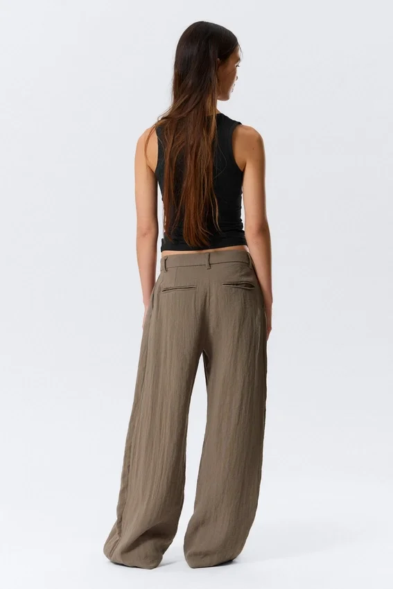 Pantalones de talle bajo y pierna ancha con efecto arrugado – Beige Pantalones de talle bajo y pierna ancha con efecto arrugado – Beige