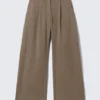 Pantalones de talle bajo y pierna ancha con efecto arrugado – Beige Pantalones de talle bajo y pierna ancha con efecto arrugado – Beige