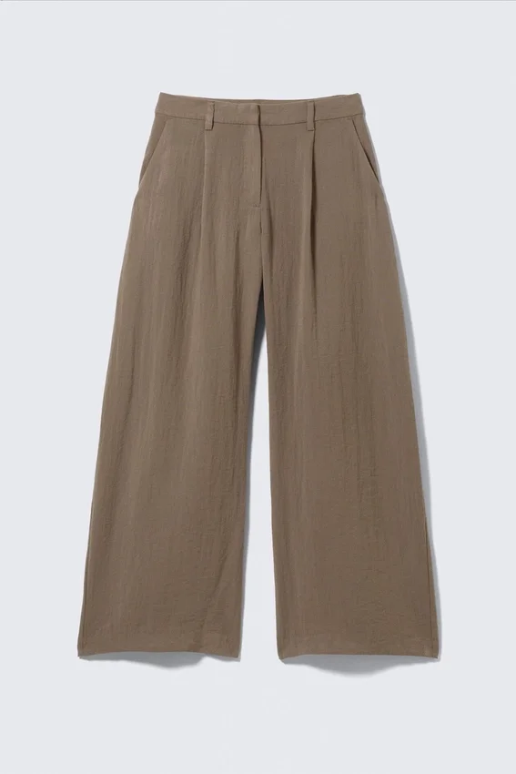Pantalones de talle bajo y pierna ancha con efecto arrugado – Beige Pantalones de talle bajo y pierna ancha con efecto arrugado – Beige