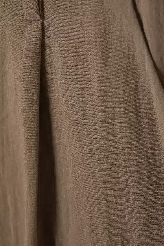 Pantalones de talle bajo y pierna ancha con efecto arrugado – Beige Pantalones de talle bajo y pierna ancha con efecto arrugado – Beige