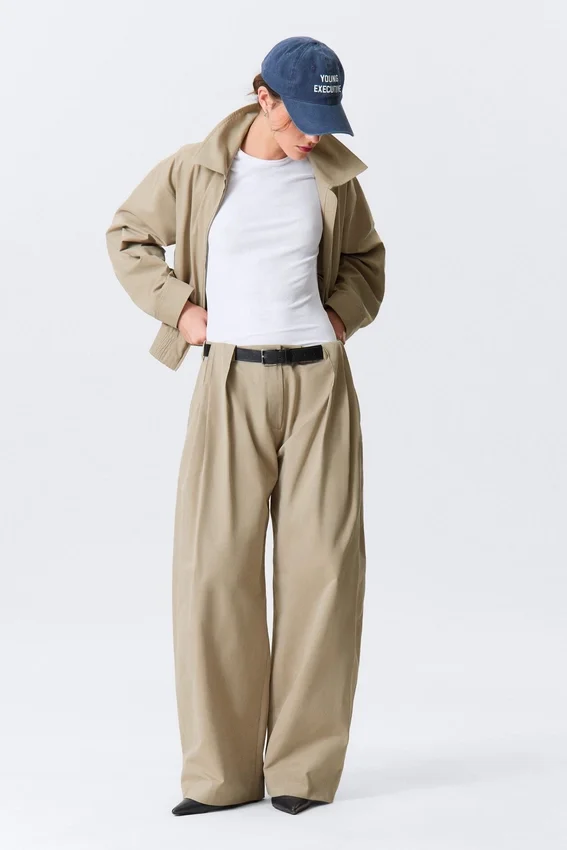 Pantalones de tiro bajo y pierna ancha con pliegues – Beige Pantalones de tiro bajo y pierna ancha con pliegues – Beige