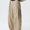 Pantalones de tiro bajo y pierna ancha con pliegues – Beige Pantalones de tiro bajo y pierna ancha con pliegues – Beige