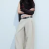 Pantalones de tiro bajo y pierna ancha con pliegues – Gris claro Pantalones de tiro bajo y pierna ancha con pliegues – Gris claro