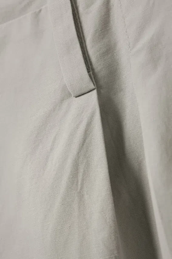 Pantalones de tiro bajo y pierna ancha con pliegues – Gris claro Pantalones de tiro bajo y pierna ancha con pliegues – Gris claro