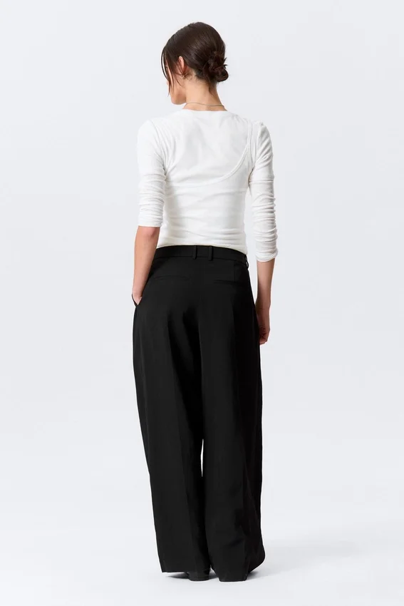 Pantalones de traje asimétricos de corte ancho – Negro Pantalones de traje asimétricos de corte ancho – Negro