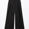 Pantalones de traje de cintura alta y pierna ancha con pliegues – Negro Pantalones de traje de cintura alta y pierna ancha con pliegues – Negro
