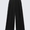 Pantalones de traje de cintura alta y pierna ancha con pliegues – Negro Pantalones de traje de cintura alta y pierna ancha con pliegues – Negro