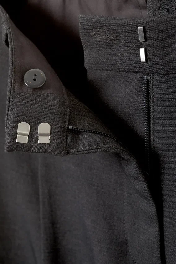Pantalones de traje holgados con pliegues y talle bajo – Gris oscuro jaspeado Pantalones de traje holgados con pliegues y talle bajo – Gris oscuro jaspeado