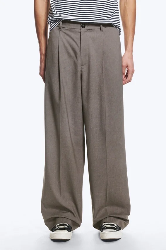 Pantalones de traje holgados Uno – Beige oscuro jaspeado Pantalones de traje holgados Uno – Beige oscuro jaspeado