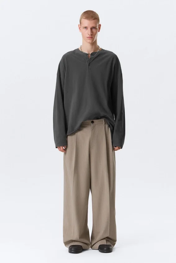 Pantalones de traje plisados de corte holgado Nate – Beige jaspeado a rayas Pantalones de traje plisados de corte holgado Nate – Beige jaspeado a rayas