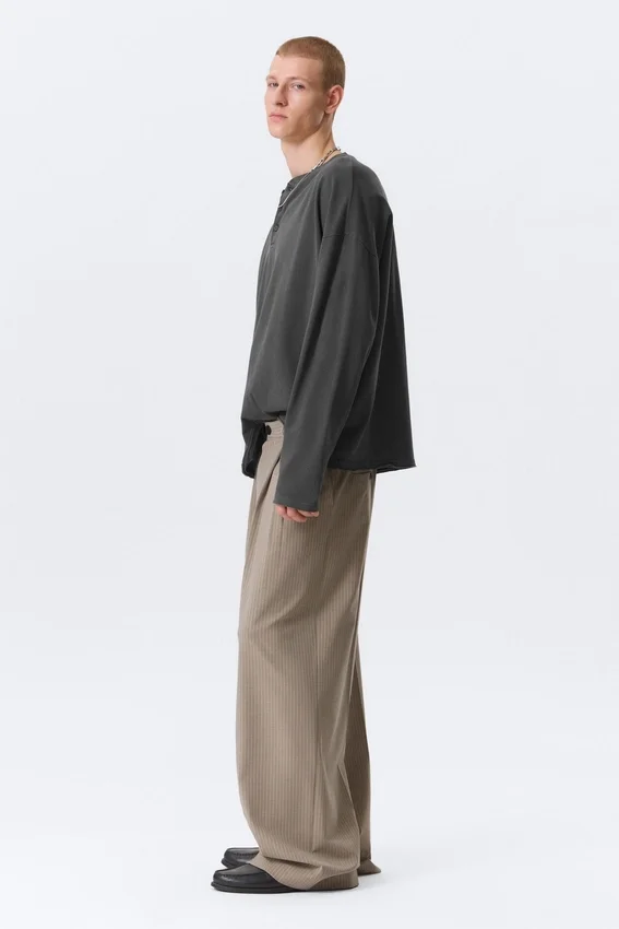 Pantalones de traje plisados de corte holgado Nate – Beige jaspeado a rayas Pantalones de traje plisados de corte holgado Nate – Beige jaspeado a rayas