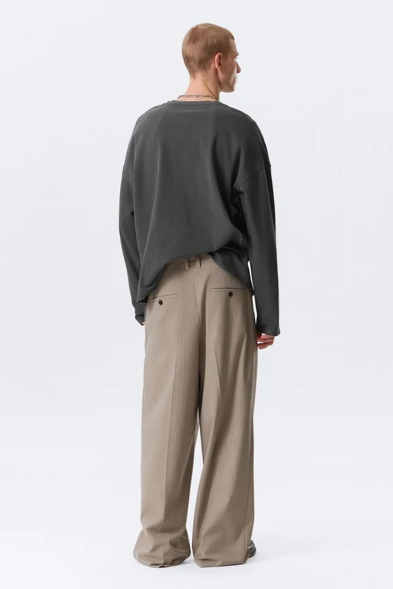 Pantalones de traje plisados de corte holgado Nate – Beige jaspeado a rayas Pantalones de traje plisados de corte holgado Nate – Beige jaspeado a rayas
