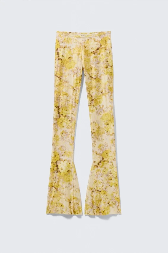 Pantalones elásticos acampanados de talle bajo – Amarillo claro – Estampado floral Pantalones elásticos acampanados de talle bajo – Amarillo claro – Estampado floral