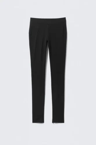Pantalones elásticos con cremallera – Oscuros