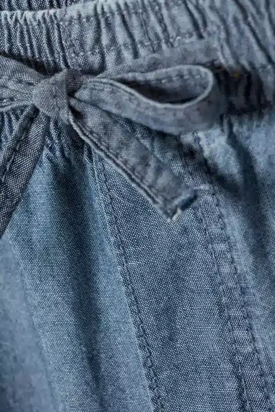 Pantalones holgados de cambray – Azul lavado Pantalones holgados de cambray – Azul lavado