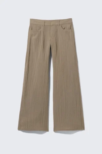 Pantalones holgados de cintura baja con efecto arrugado – Beige