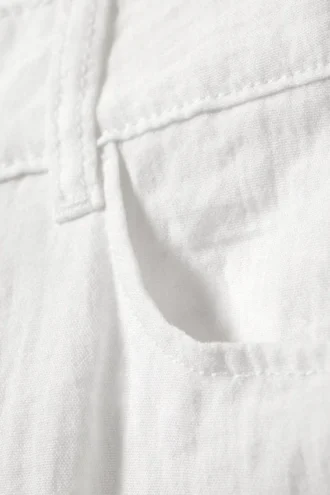 Pantalones holgados de cintura baja con efecto arrugado – Blanco