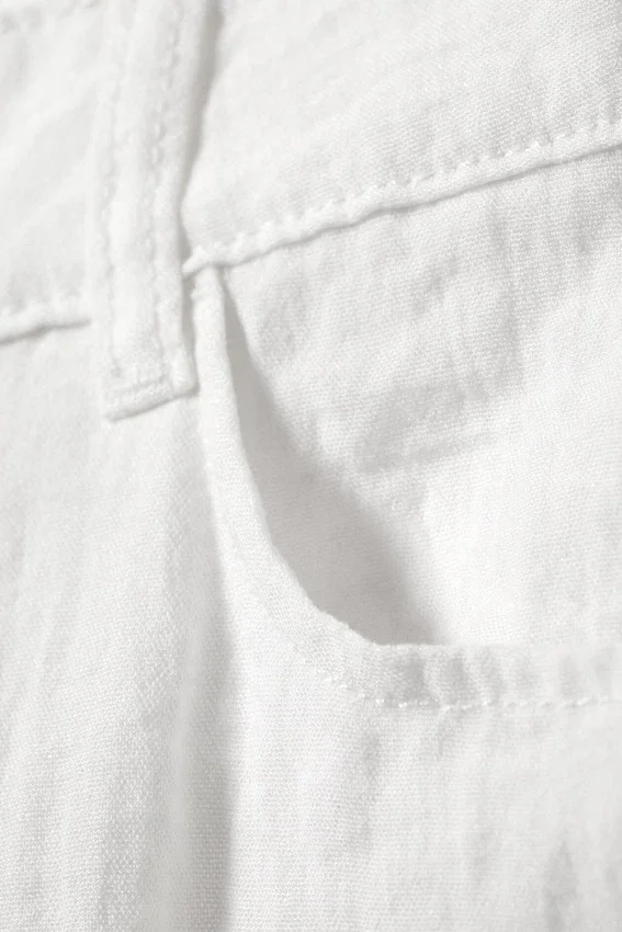 Pantalones holgados de cintura baja con efecto arrugado – Blanco Pantalones holgados de cintura baja con efecto arrugado – Blanco