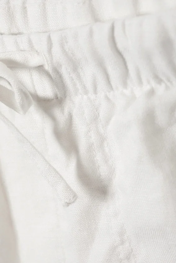 Pantalones holgados de lino – Blanco roto Pantalones holgados de lino – Blanco roto