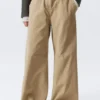 Pantalones holgados de talle bajo con tejido ripstop – Beige Pantalones holgados de talle bajo con tejido ripstop – Beige