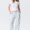 Pantalones holgados de talle bajo sin cremallera – Blanco – Rayas azules Pantalones holgados de talle bajo sin cremallera – Blanco – Rayas azules