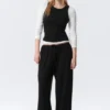 Pantalones holgados de talle medio con efecto globo – Negro