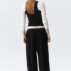 Pantalones holgados de talle medio con efecto globo – Negro