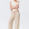 Pantalones holgados de talle medio con volantes – Beige claro Pantalones holgados de talle medio con volantes – Beige claro