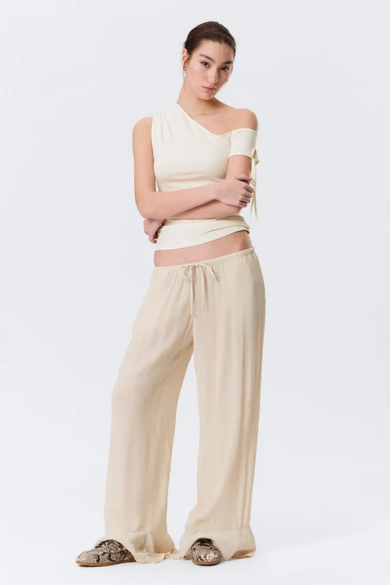 Pantalones holgados de talle medio con volantes – Beige claro Pantalones holgados de talle medio con volantes – Beige claro