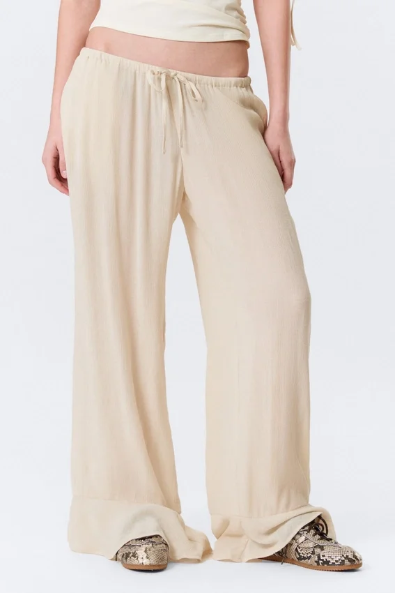 Pantalones holgados de talle medio con volantes – Beige claro Pantalones holgados de talle medio con volantes – Beige claro