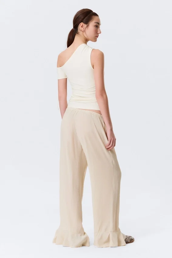 Pantalones holgados de talle medio con volantes – Beige claro Pantalones holgados de talle medio con volantes – Beige claro